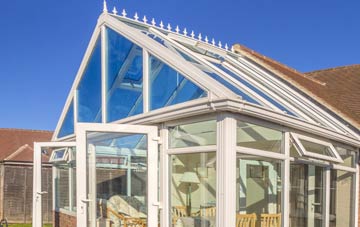 conservatory roof insulation costs West Kilburn
